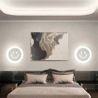 Modern white acrylic led wall sconce with smiling face design emitting soft white glow for childrens bedroom decorbites acrylic led wall sconce