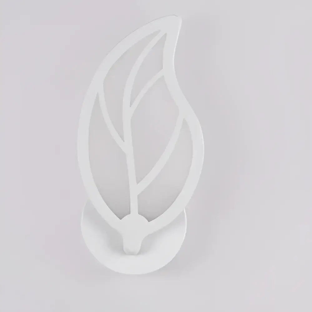 Modern white acrylic led wall sconce with leaf cut out design for childrens bedroom decor by decorbites acrylic led
