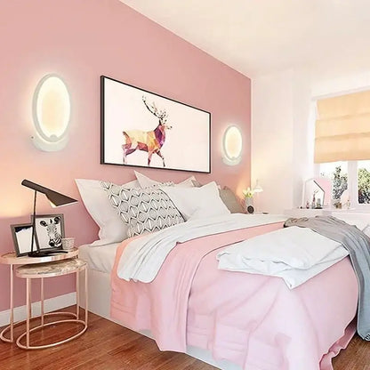 Modern white acrylic led wall sconce with pink bedspread and white bedding for childrens bedroom decorbites acrylic led