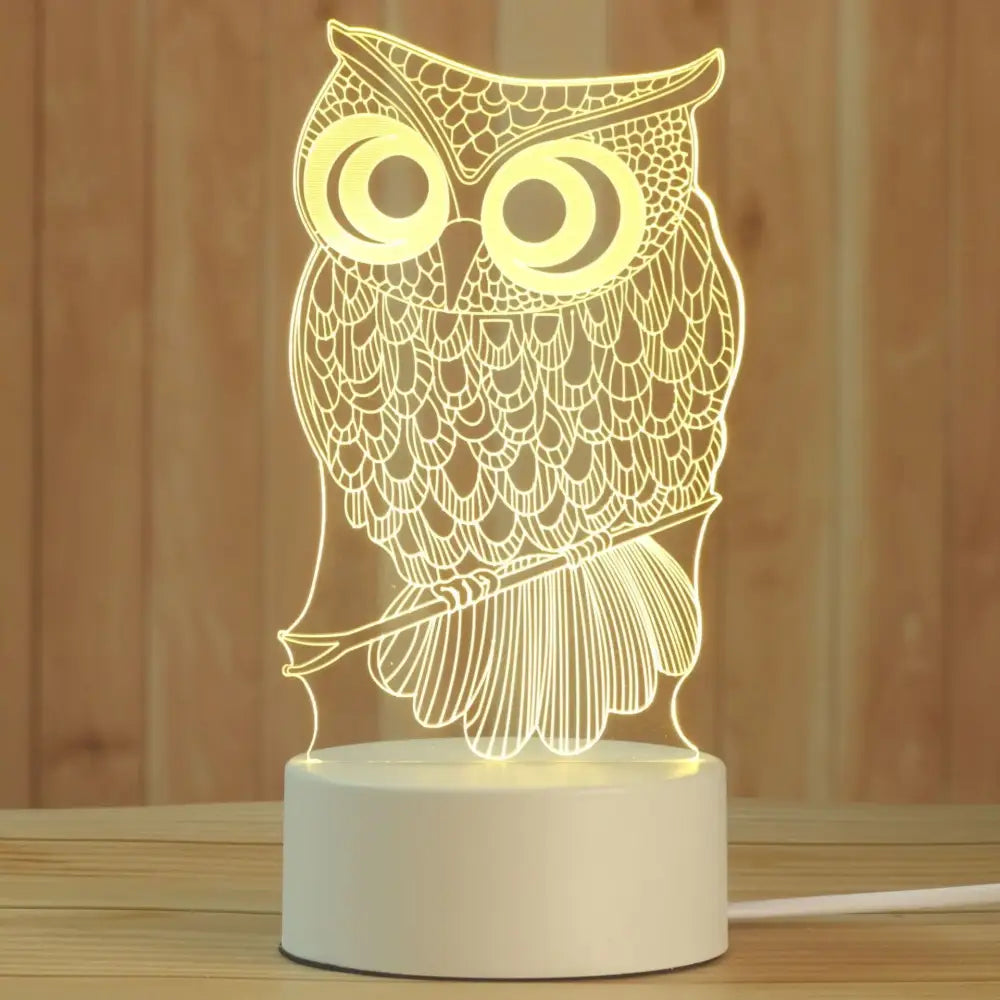 Modern white acrylic night lamp featuring a glowing owl-shaped decorbites 3d acrylic design with warm yellow light