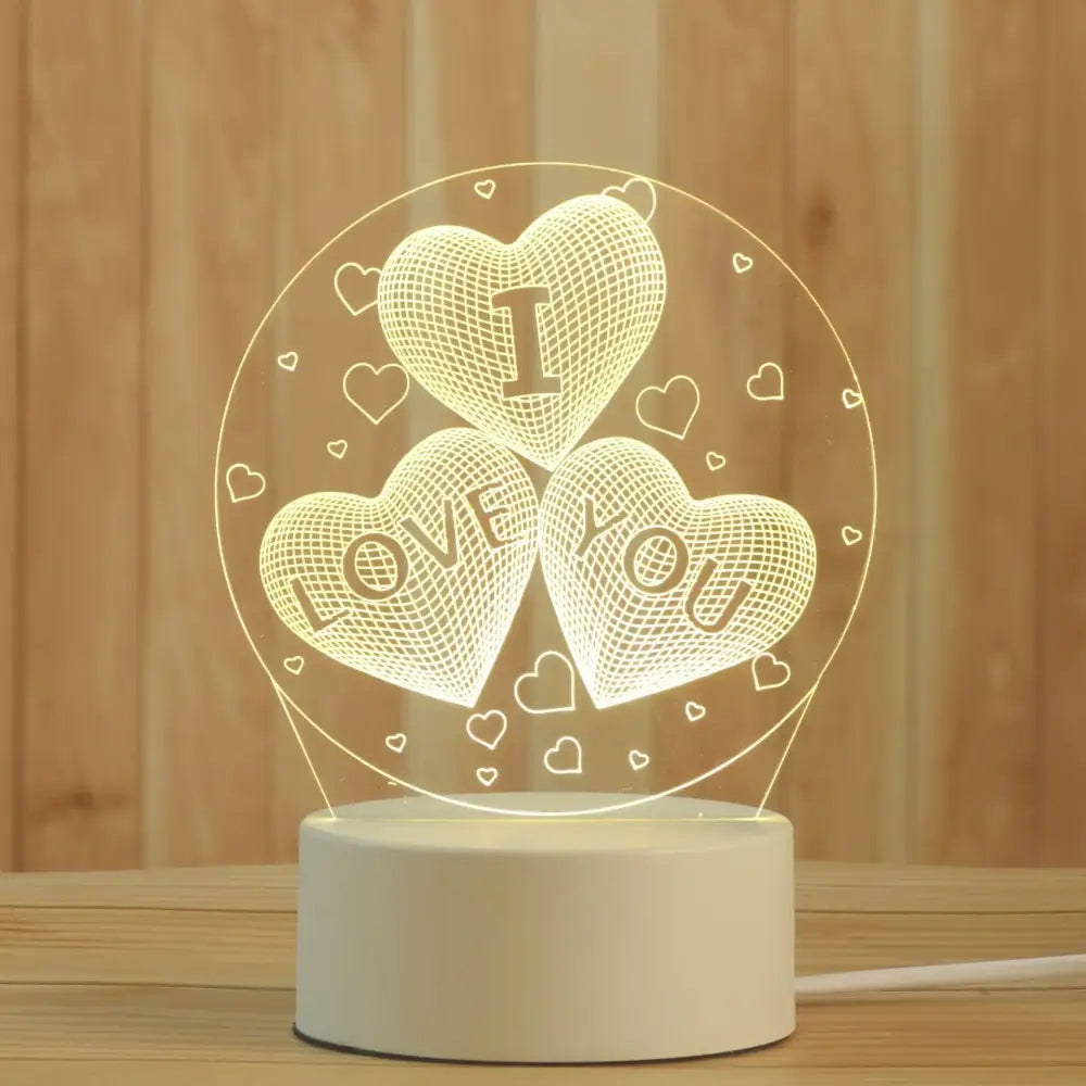 Modern white acrylic night lamp with warm glowing 3d led decor featuring interlocking hearts and i love you design