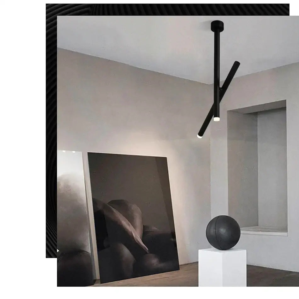 Black minimalist ceiling spotlights with two intersecting adjustable double angle cylindrical arms for modern decorbites lighting