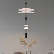Modern white and black circular pendant light with tiered translucent disc shades and black cylindrical accents for dining room decorbites circular pendant