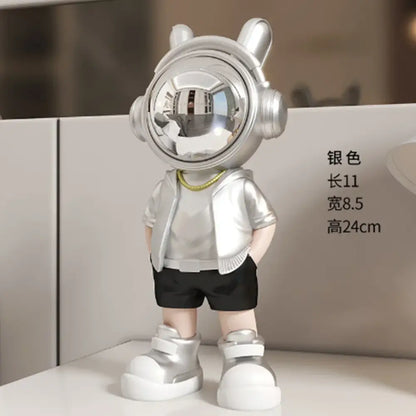 Modern white and blue astronaut resin sculpture featuring a silver figurine with reflective helmet and metallic jacket for decor