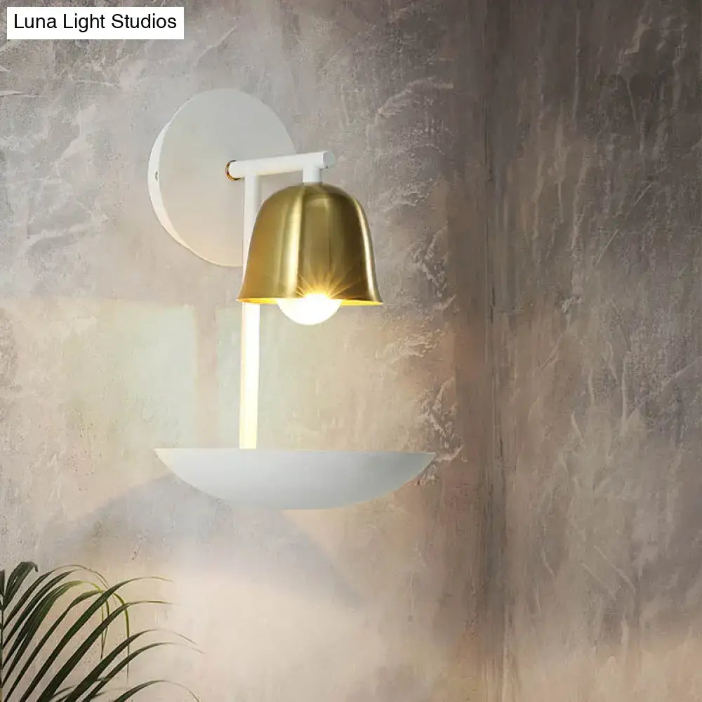 Modern white and brass bell metal sconce with gold bell-shaped lampshade and integrated bowl for bedroom wall lamp