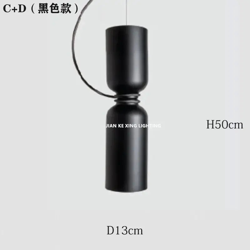 Black matte pendant light with a sleek modern design featured in modern white and copper ceramic dining room decorbites designer iron chandelier
