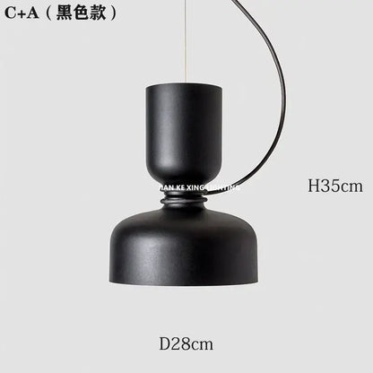 Black matte-finished c+a pendant light with sleek modern design featuring cylindrical top and dome shade by decorbites designer iron chandelier