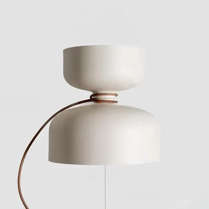 Modern cream ceramic pendant light with curved brown leather strap featuring stacked shades for dining room decorbites designer iron chandelier