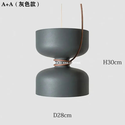 A sleek matte gray a+a pendant light with double-bowl design and leather accent by decorbites designer iron chandelier