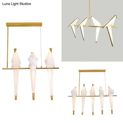 Decorbites modern gold-toned bird shaped island pendant light with translucent white paper shades for bedroom