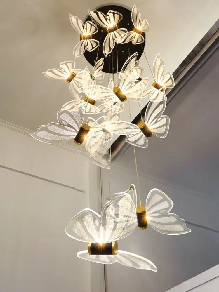 Modern white and gold butterfly chandelier bedroom pendant light with delicate translucent wings and gold-toned accents decorbites butterfly chandelier