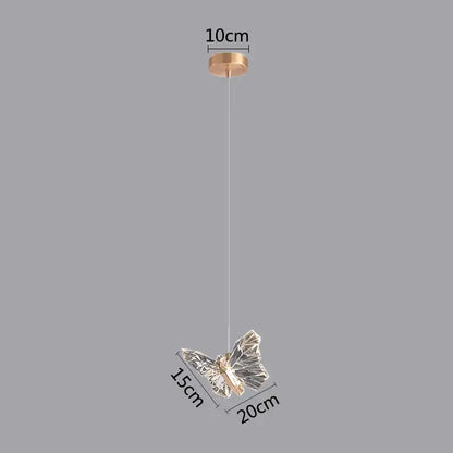 Modern white and gold butterfly pendant lights featuring a delicate transparent crystal butterfly pendant on a gold mount