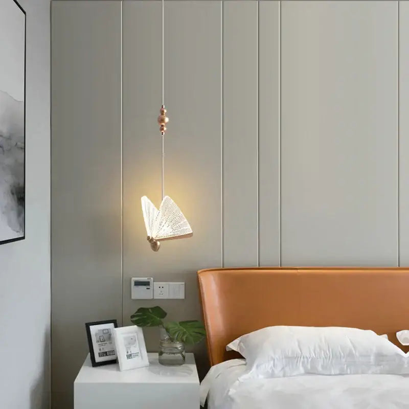 Modern white and gold butterfly pendant lights featuring a delicate white design with copper metal base for bedroom decorbites decor