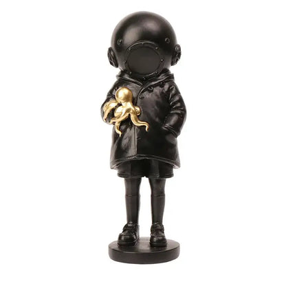 Black resin deepsea diver sculpture of child in vintage helmet and coat holding golden octopus for living room decor