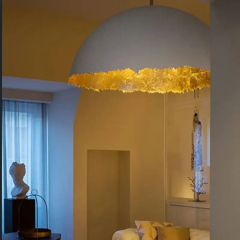 Modern white and gold eggshell acrylic resin pendant light with dome shape and textured rim for dining room use
