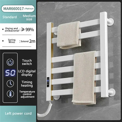 Modern white and gold electric towel radiator warmer with digital display and bathroom storage shelf for efficient drying