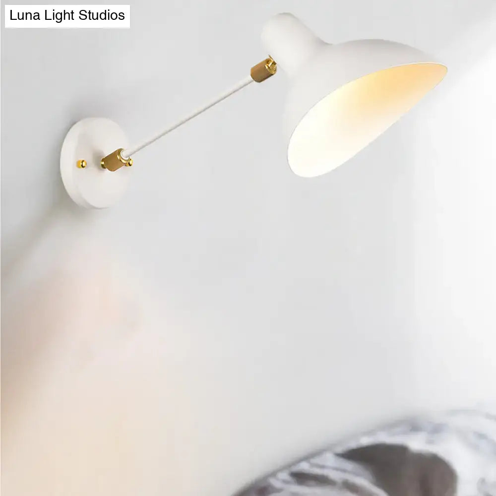 Modern white and gold wall mounted lamp with sleek adjustable arm and brass accents for living room lighting