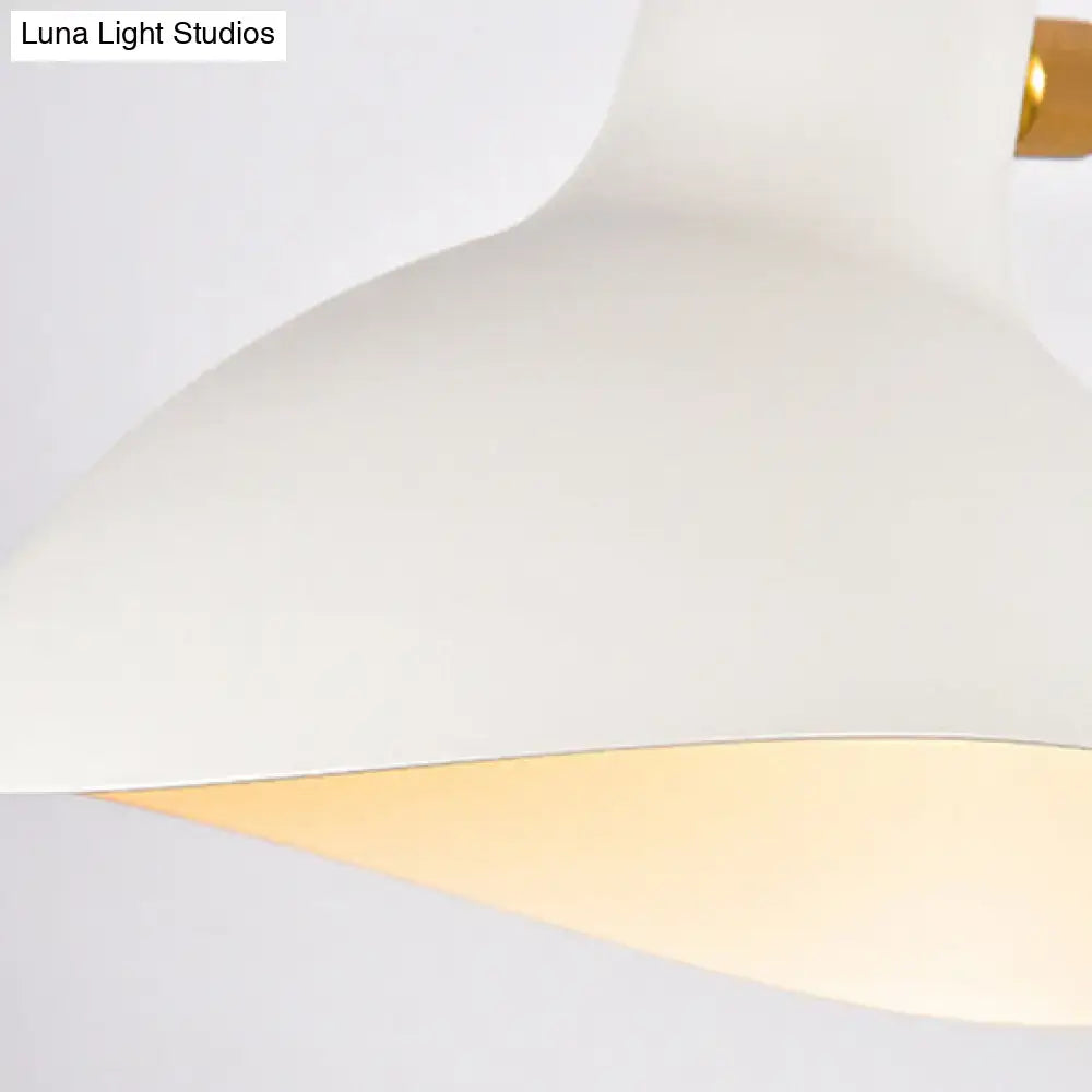 A modern white matte wall mounted lamp with gold trim for living room led incandescent fluorescent lighting