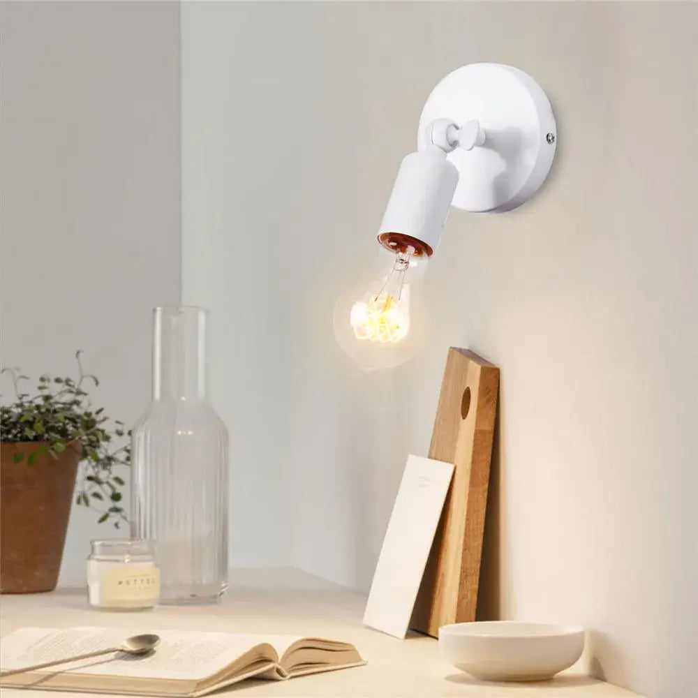 Modern white wall lamp with copper-toned base and exposed filament bulb for bedroom decorbites iron wood led sconce