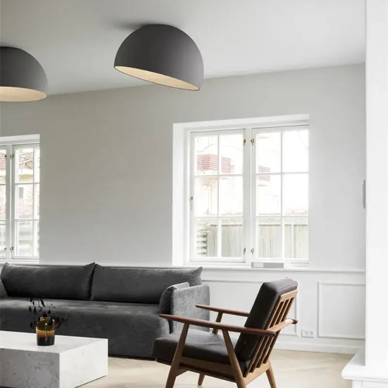 Modern white and wood duo ceiling light with dark gray dome shape and warm inner glow for kitchen use