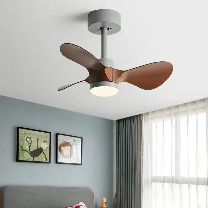 Modern white and wood mini ceiling fan with sleek gray metal housing warm wooden blades and integrated led light fixture