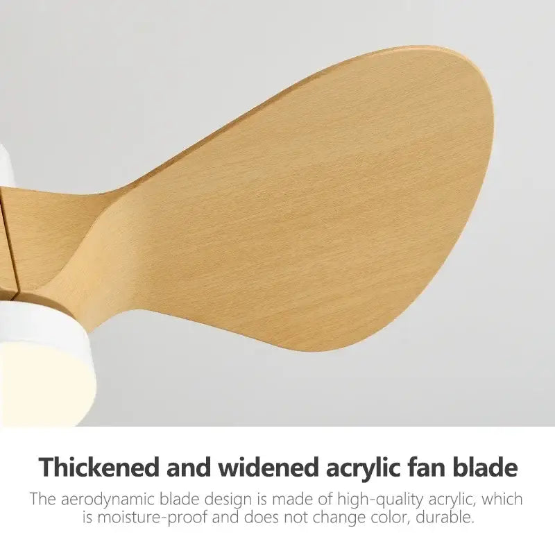 A sleek light wood-toned acrylic fan blade of a modern white and wood mini ceiling fan with led light for bedroom use