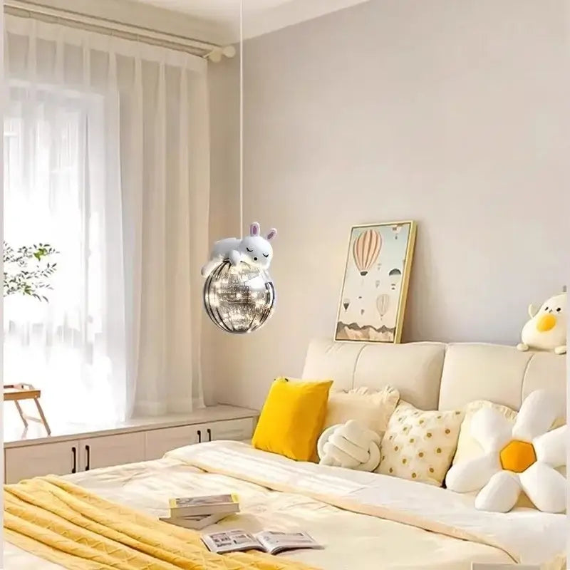 Modern white bear glass children room chandelier with a plush white bunny on a reflective disco-ball sphere light