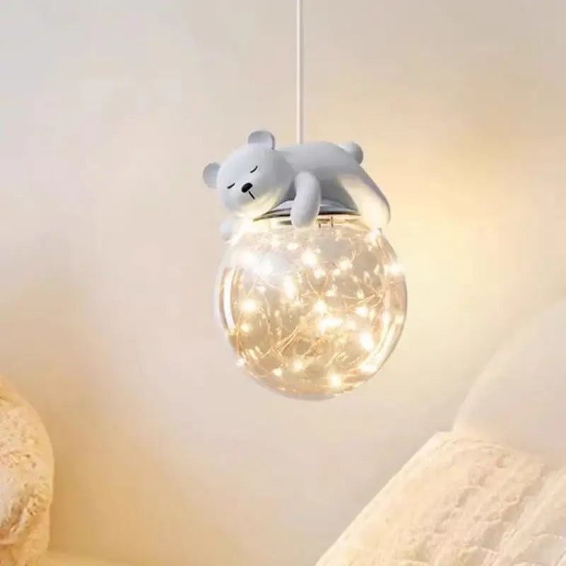 Modern white bear glass children room chandelier featuring a plush white bear and warm fairy lights for bedroom decor