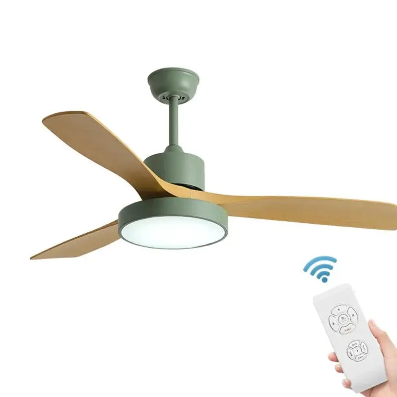 Modern sage green ceiling fan with three light wood blades and blade copper motor shown with white remote control
