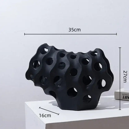 Black textured ceramic coral geometric resin sculpture with porous organic design for modern living room decor