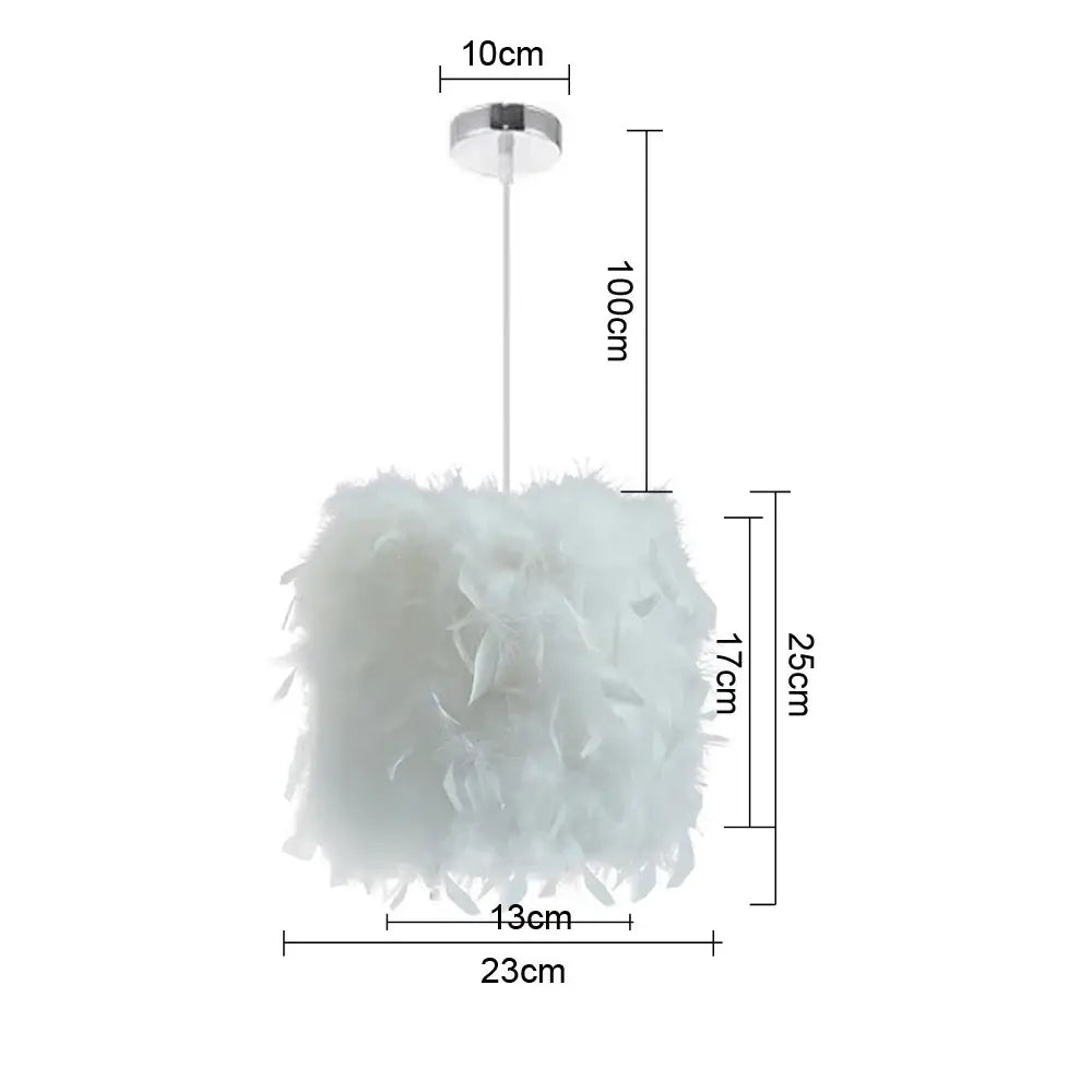 Modern white feather pendant light with cylindrical shade and chrome ceiling mount for bedroom cloud design