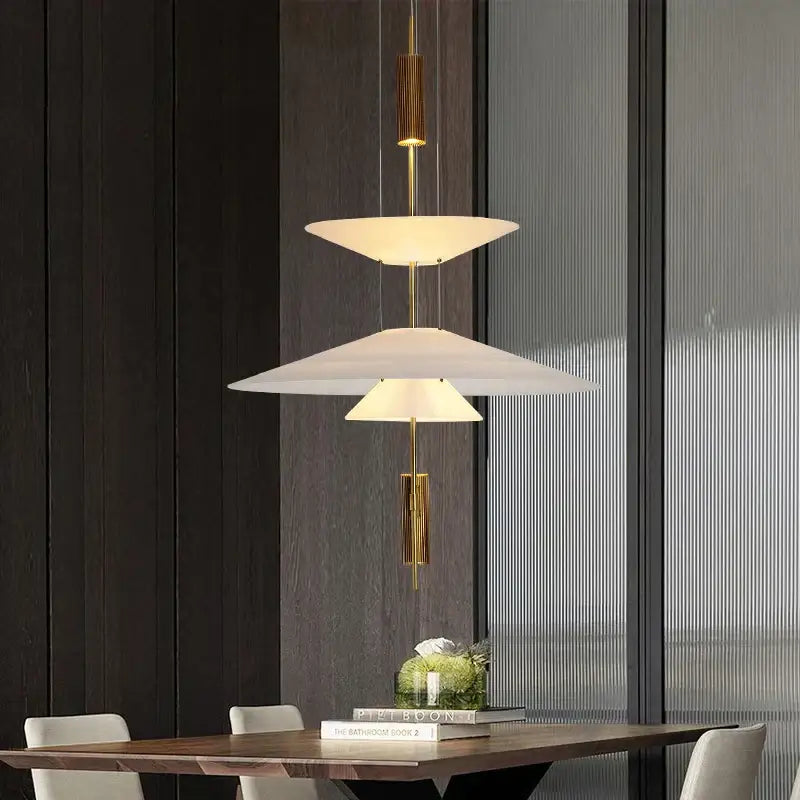 Modern white and gold decorbites flying saucer pendant light with translucent disc shades for dining room decor