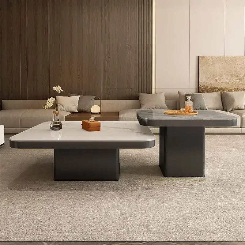 Modern white and black luxury rock square coffee table with a sleek white marble top and dark gray base for living room