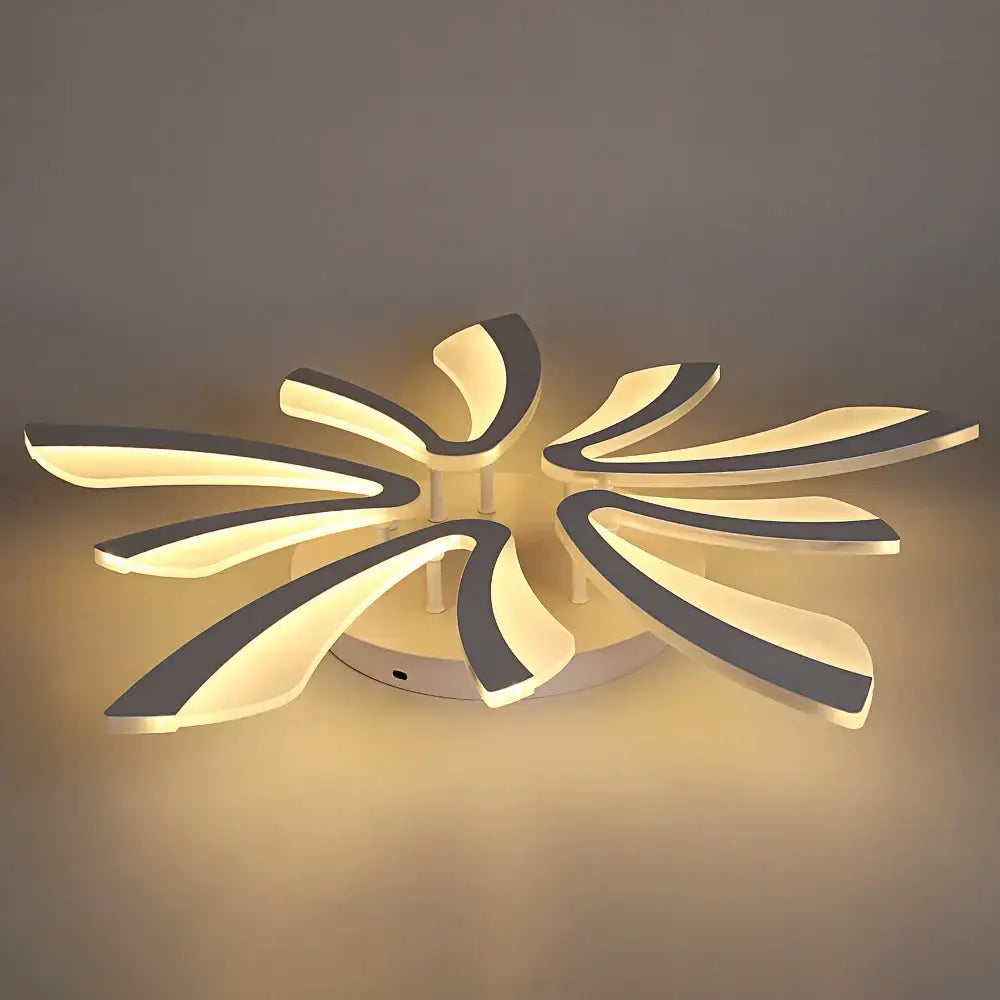 Modern white and gray led ceiling chandelier with sleek branch design and petal-like elements for living room lighting
