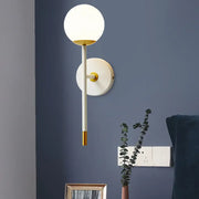 Modern wall lamp with milk frosted glass globe and white and brass metal accents for bedroom sconce 220v-240v 110v-120v
