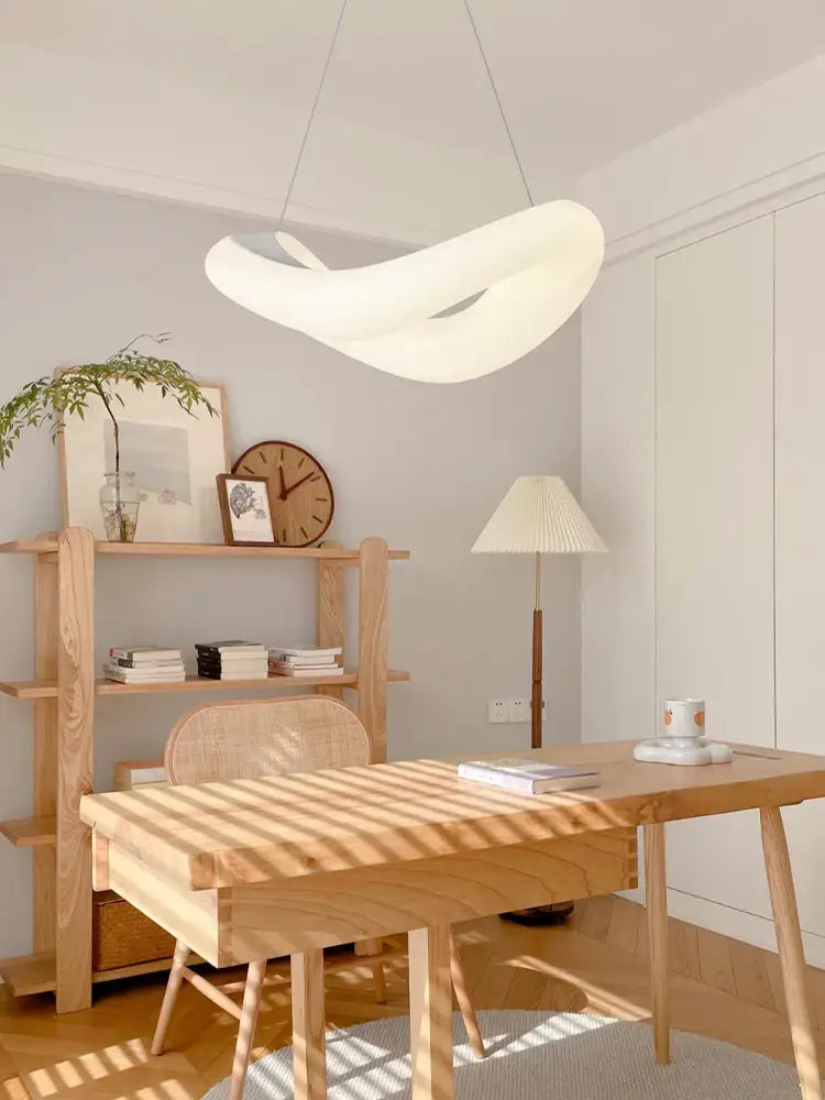 A modern white decorbites bubble led chandelier pendant light with smooth flowing design for living room decor