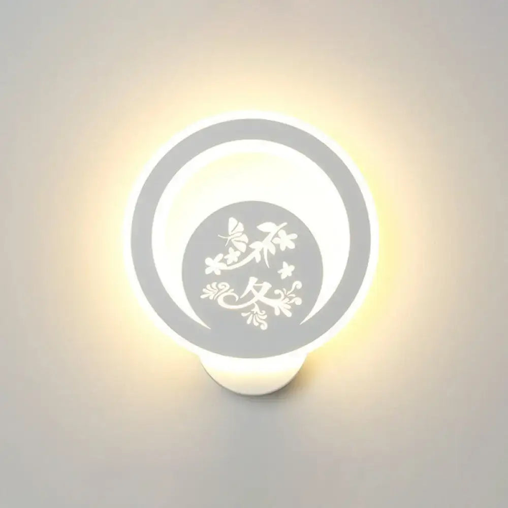 A modern white cartoon dog led wall light fixture 110v-120v with gray acrylic floral design and soft glowing illumination