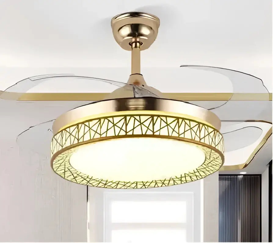 Modern white ceiling fan with curved blades and gold-toned fan lights featuring a geometric lattice design