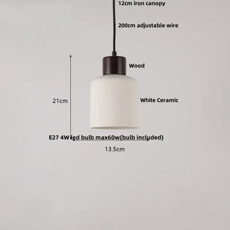 Modern white ceramic pendant light fixture with ribbed texture and dark wood top for kitchen decor