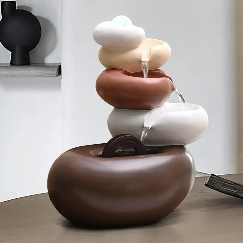 Modern white ceramic circulating water fountain with smooth stone-like tiers in earthy tones for living room decorbites decorbites circulating water fountain