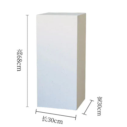 White ceramic circulating water fountain on a 68cm tall white rectangular display pedestal for modern living room decor