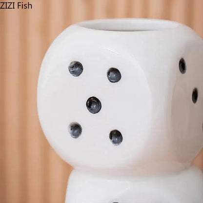 Modern white ceramic dice vase oil diffuser with black dot accents for living room decorbites ceramic dice decor