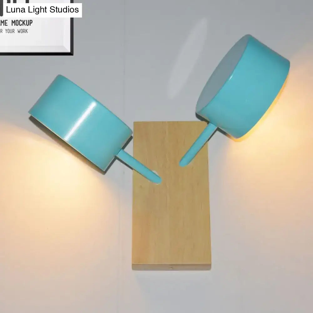 Modern white ceramic double drum wall sconce kitchen light with turquoise ceramic saucepans on wooden base fixture height