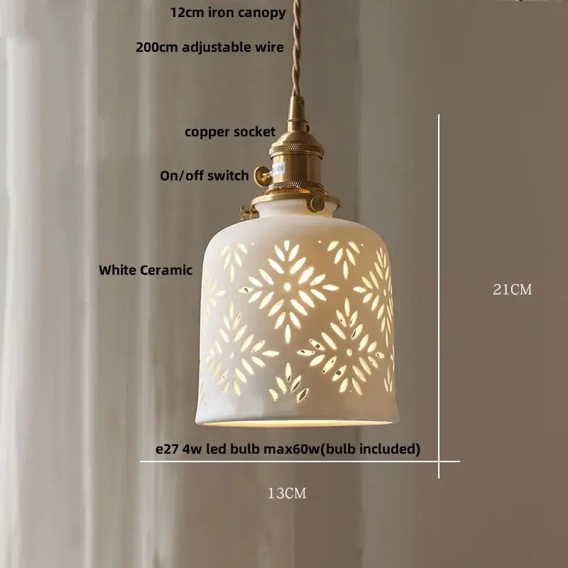 Modern white ceramic flower pendant lamp with intricate leaf-patterned cutouts and brass-finished socket for kitchen decorbites ceramic flower led lighting