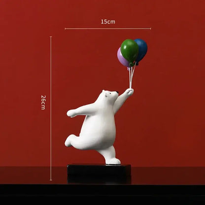 Modern white ceramic flying bear figurines showing a white bear holding colorful balloons for kids bedroom decor