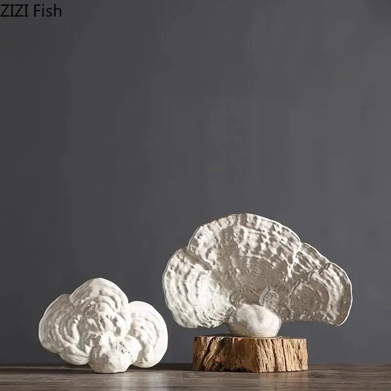 Modern white ceramic ganoderma lucidum sculpture with textured layered surfaces on a rustic wooden base for living room decor