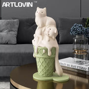 Modern white ceramic cream cat sculpture with three cats stacked on green waffle cone ice cream for living room decor