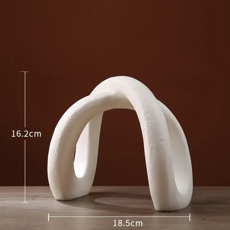 Modern white ceramic infinity symbol vase with smooth flowing curves for decorbites infinity living room decor
