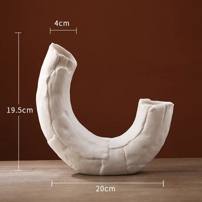 Modern white ceramic infinity symbol vase with textured cracked surface and two open ends by decorbites infinity