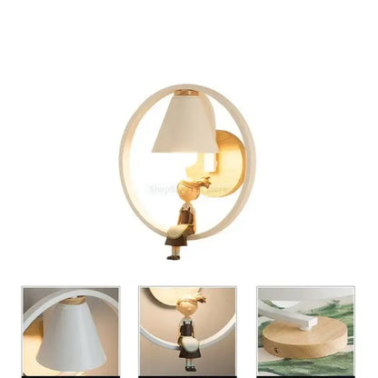 A modern white led wall lamp with a cute cartoon girl figurine and soft beige conical shade for bedroom use